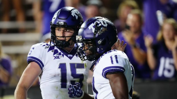 Sep 2, 2022; Boulder, Colorado, USA; TCU Horned Frogs wide receiver Derius Davis (11) celebrates his touchdown with quarterback Max Duggan (15) in the fourth quarter against the Colorado Buffaloes at Folsom Field. Mandatory Credit: Ron Chenoy-USA TODAY Sports